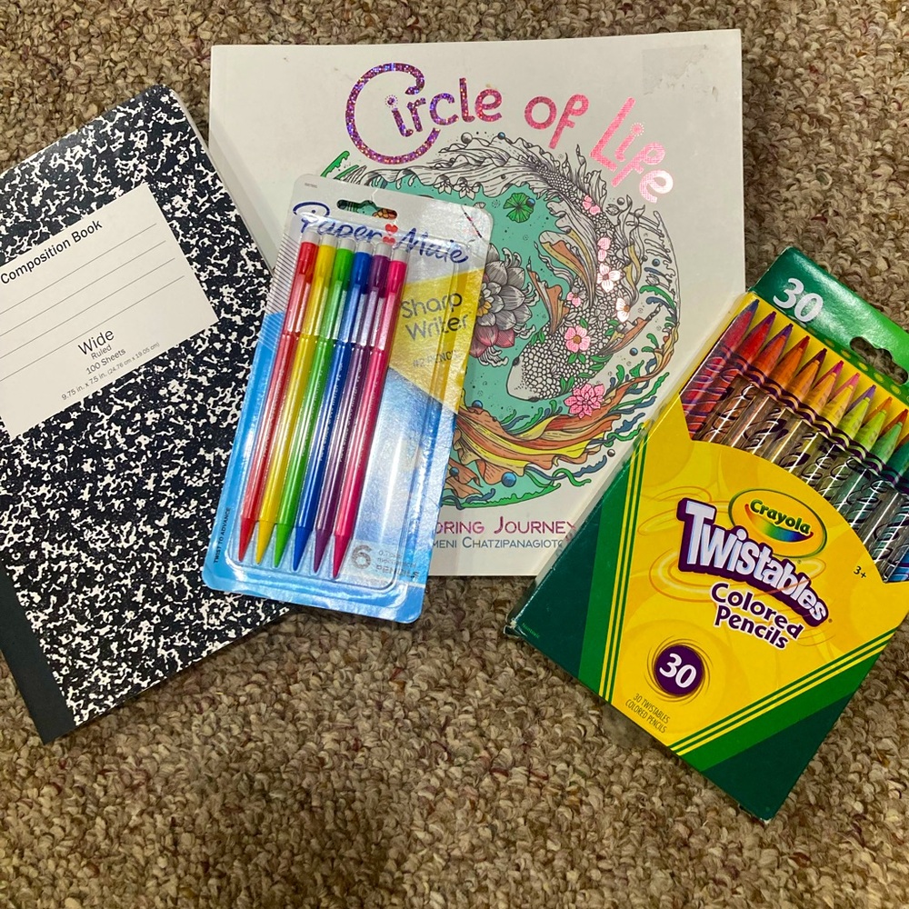 Brand new Adult coloring book with twistable colored pencils
